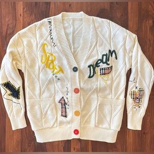 Stylish Cream Cardigan with Colorful Accents